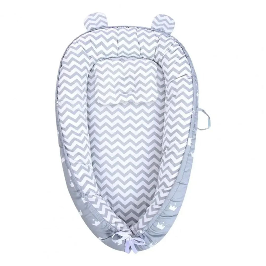 nid-d-ange-bebe-reducteur-gris