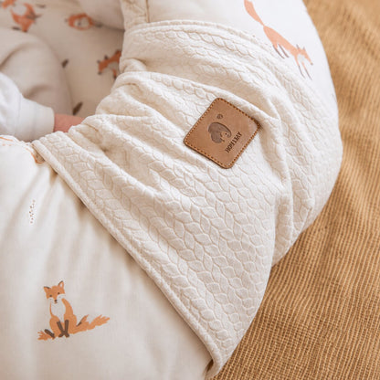 Gros plan couture elastique reducteur de lit bebe renard motif renards - Choupinoo