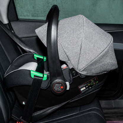 Siege auto groupe 0+ coloris gris installe sur siege arriere de voiture avec harnais de securite, poussette 3 en 1 avec siege auto et nacelle evolutive - Choupinoo