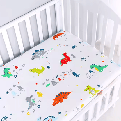 Drap housse bébé 70x100 cm motif dinosaures colorés rouge orange jaune vert - Tissu premium hypoallergénique