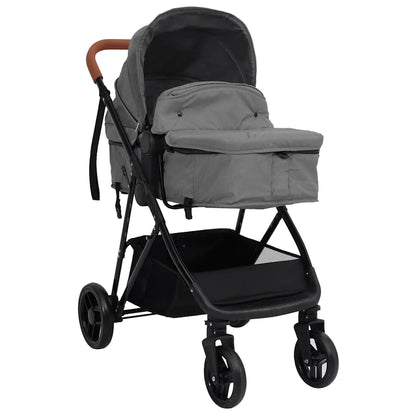 Poussette 2 en 1 avec nacelle grise coloris gris, vue avant trois quarts, capote fermee et guidon caramel - Choupinoo