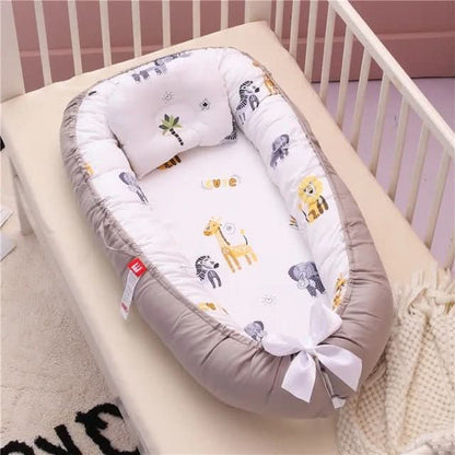 Réducteur de lit bébé cocon déhoussable 88x53 cm - Choupinoo