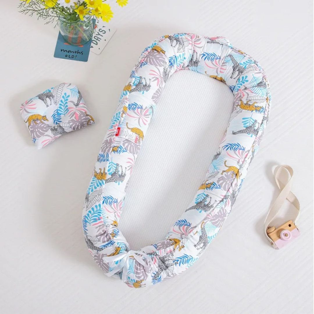 Réducteur de lit bébé cocon portable - Choupinoo